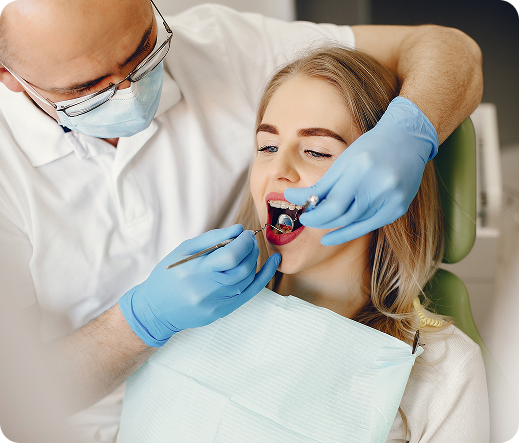 Young woman at dentist appointment receiving dental care